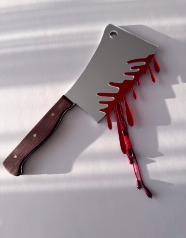 Ambush Blood Test
2025
14" long. The blade is 7.5" long and 5" wide. Including the blood drips – both beaded and acrylic – the height of the piece hanging at the right angle is 13.5"
Acrylic mirror, walnut, brass, thread, beads, paint, pine Ambush Blood Test